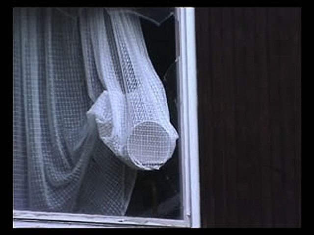 Window with pot and cutlery / Fenster mit Topf und Besteck, 2002, video still,
  photo series Jugendherberge Veckerhagen (Kirsten Kötter)